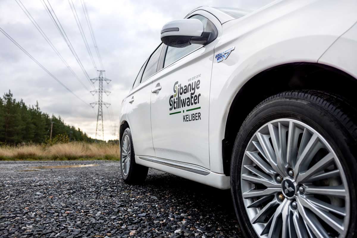 2023-car-in-forest,-powerline_S8A9750-1200x800